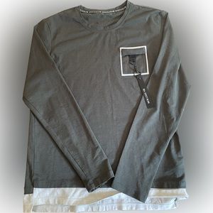 Hunter green MCM LXXX VII running shirt. 52.8% cotton 43.9% nylon 3.3% spandex